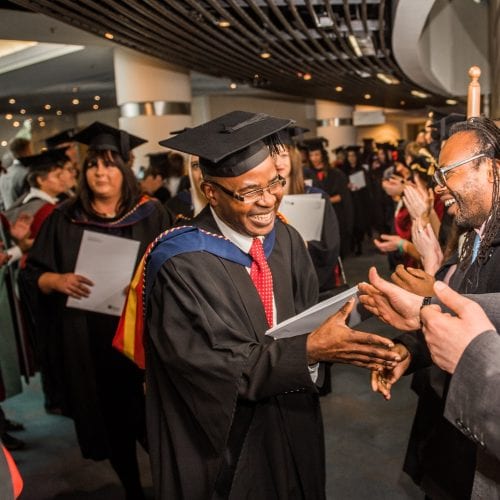 Graduation - handshake