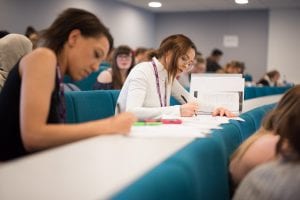 Lecture Theatre students writing