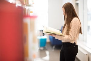 student reading in Library