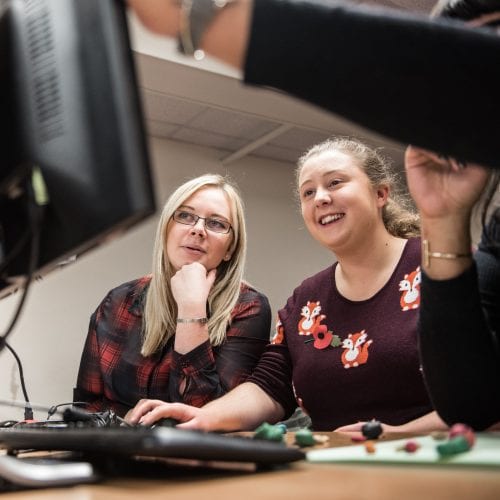female students on computer