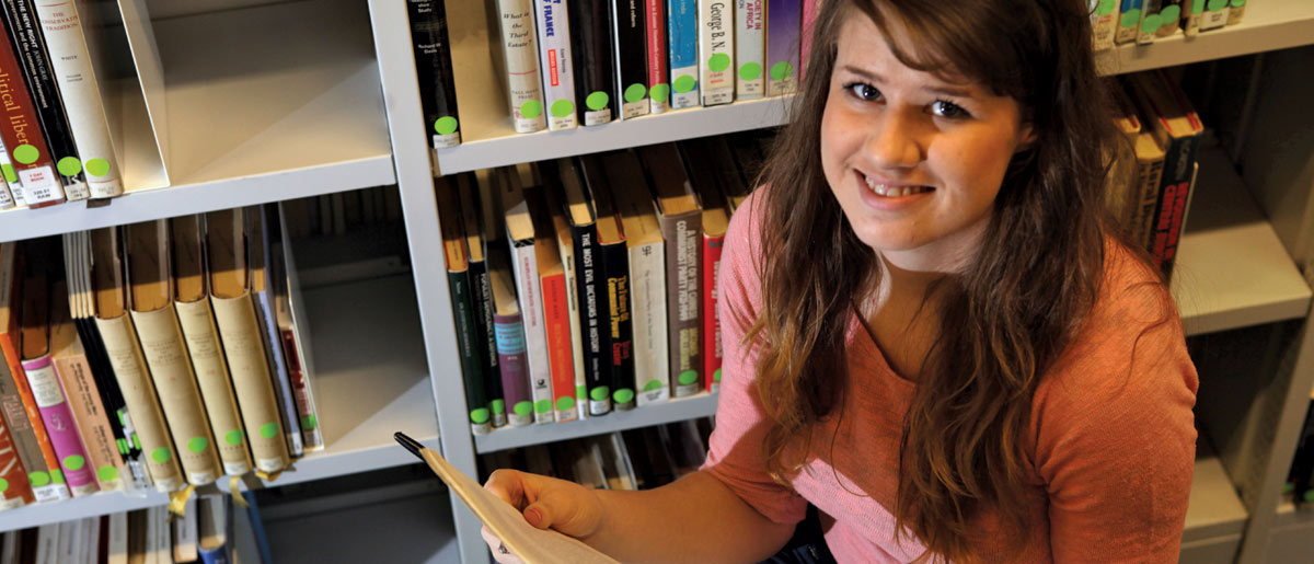 student with books