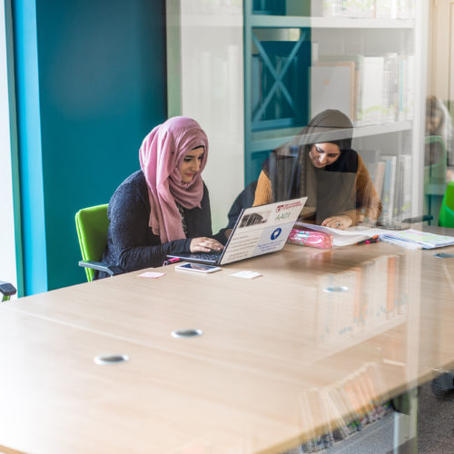 students working in library