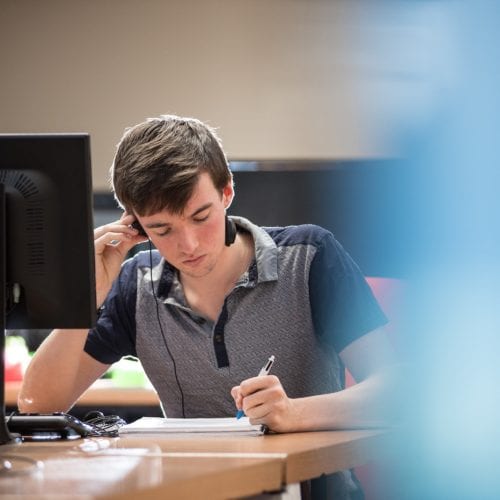 student with headphones