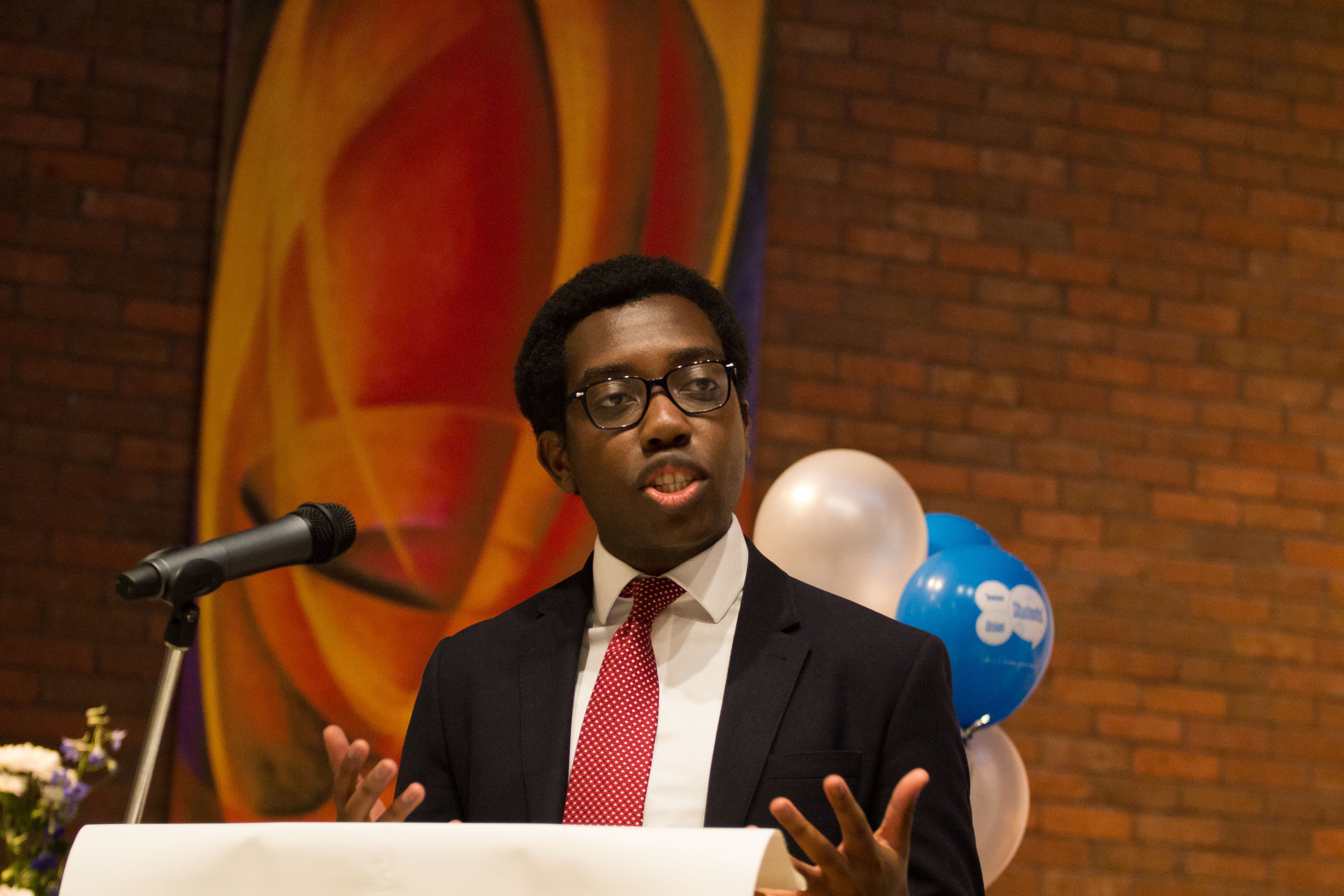 Amatey Doku speaking at Newman University