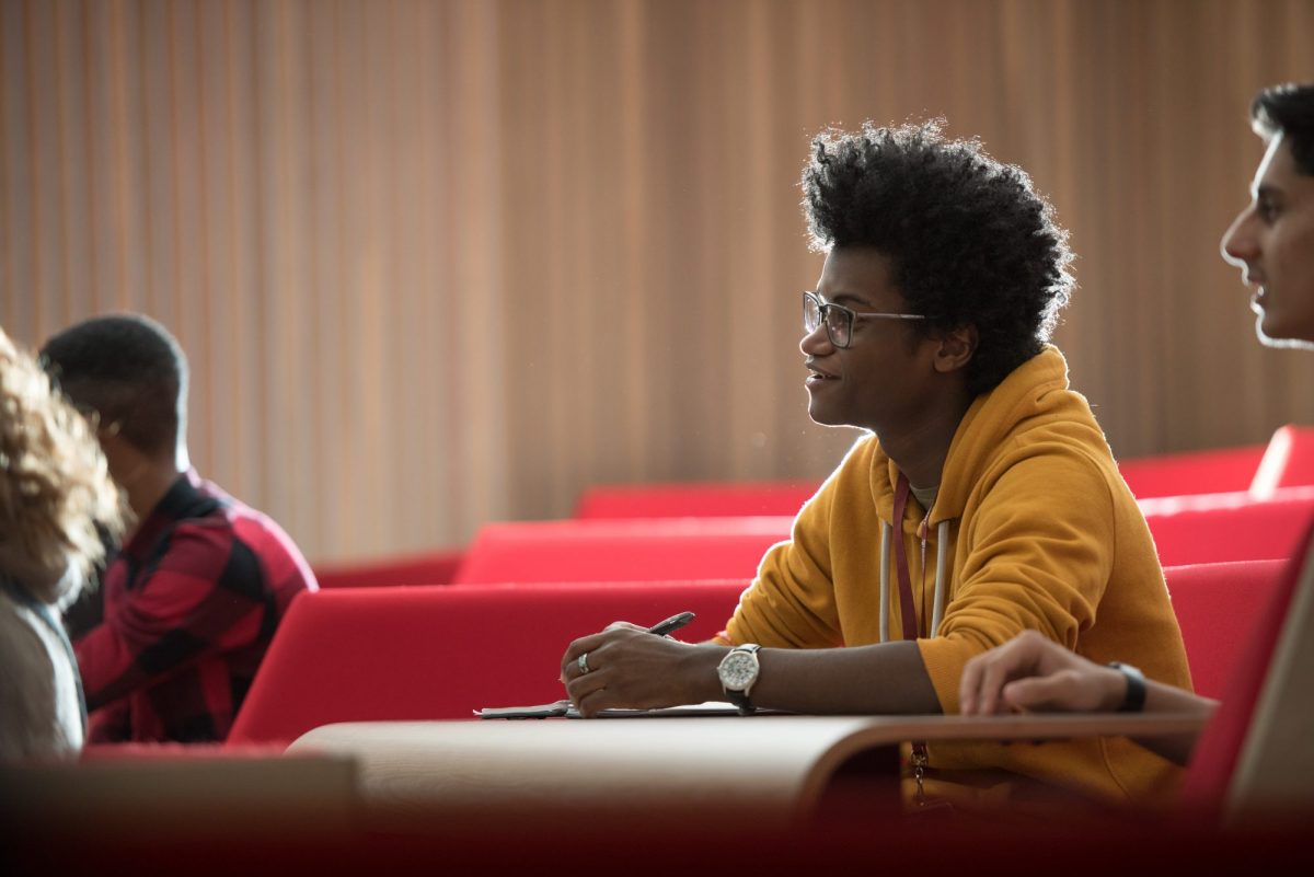 Newman student in lecture