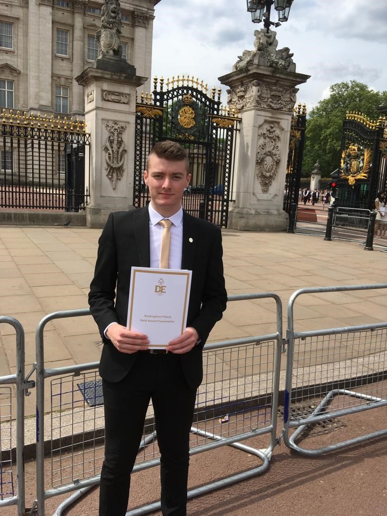 student Sam Hart collects Duke of Edinburgh award at Buckingham Palace