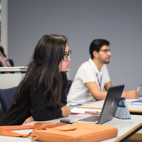 business student in lecture at an open day