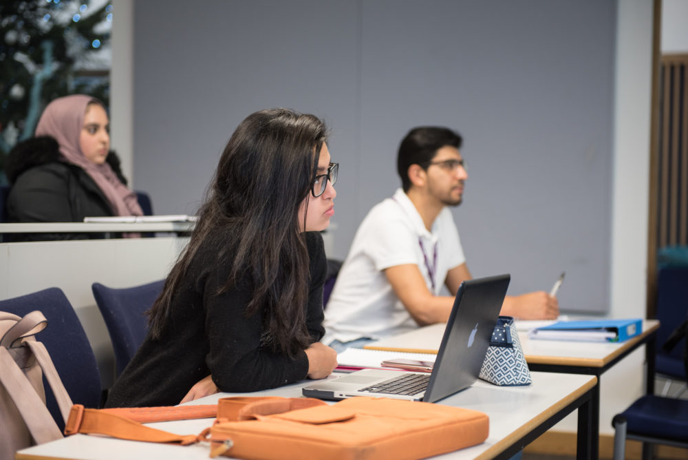 business student in lecture at an open day