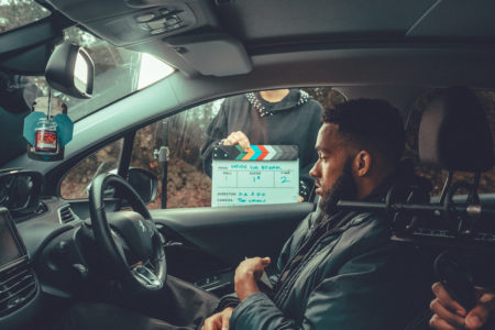 Jamaal filming for BBC short film sat in car