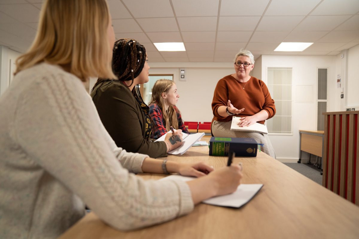 law lecturer with students