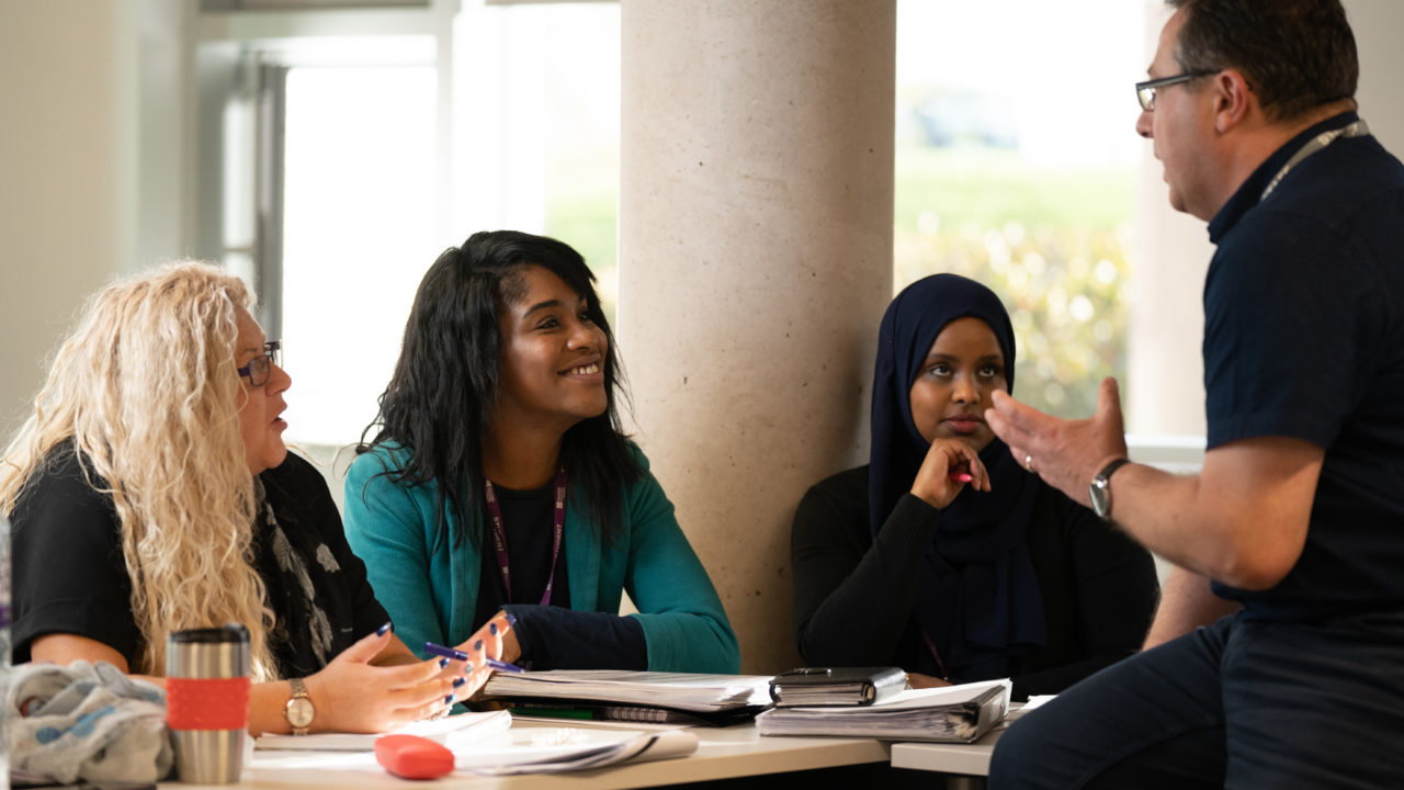 counselling lecturer with students