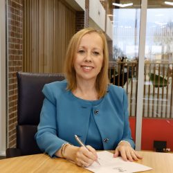 Vice Chancellor Jackie Dunne Signing the Armed Forces Covenant