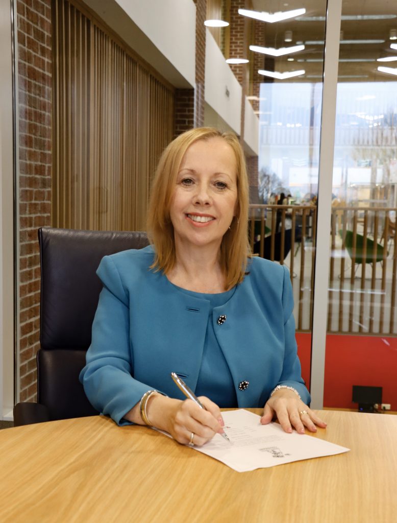 Vice Chancellor Jackie Dunne Signing the Armed Forces Covenant
