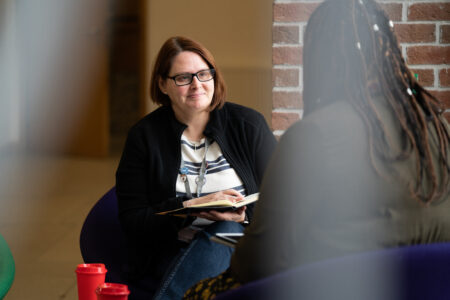 chaplaincy lecturer talking to student
