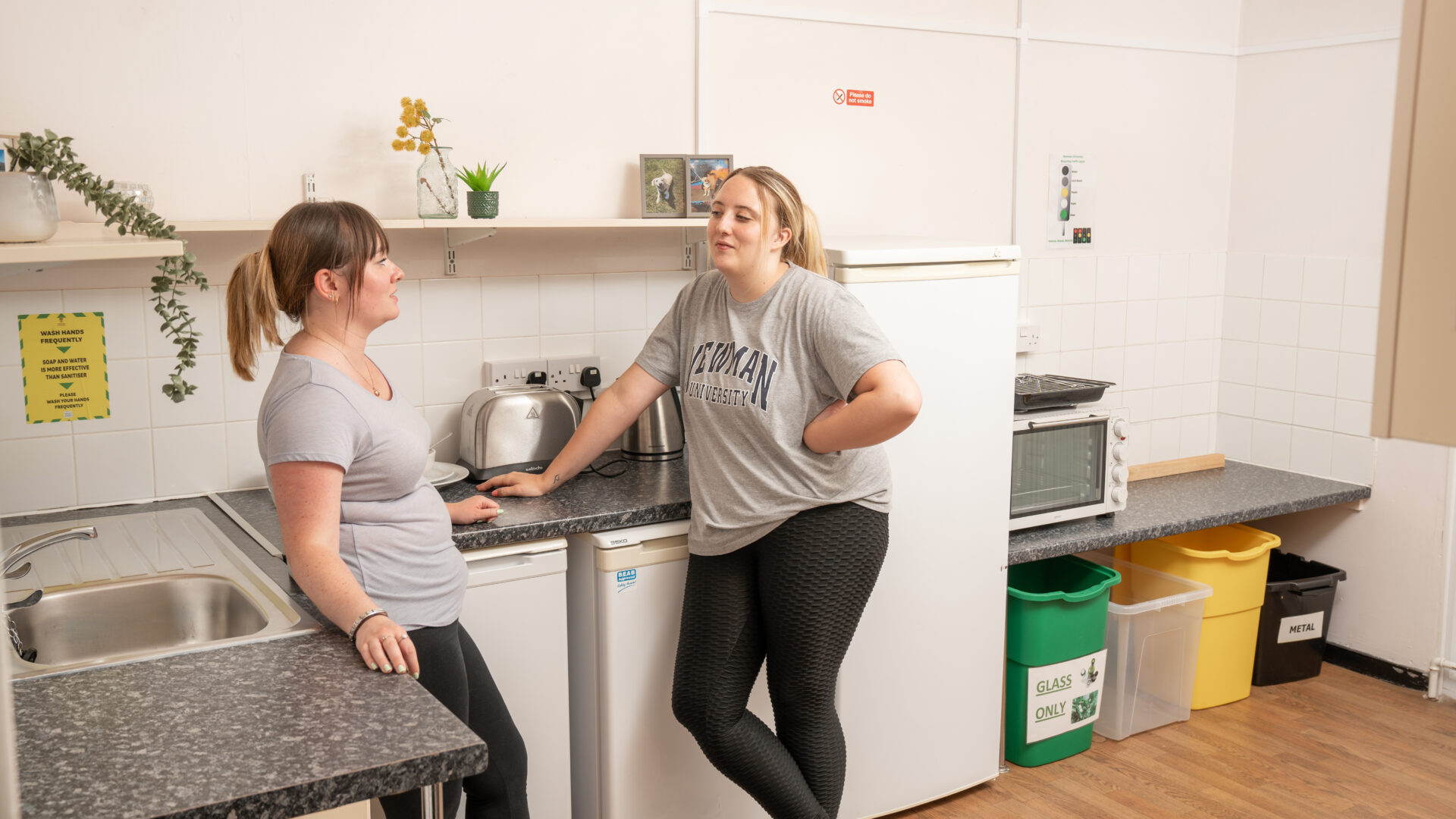 students in the shared kitchen of the original halls