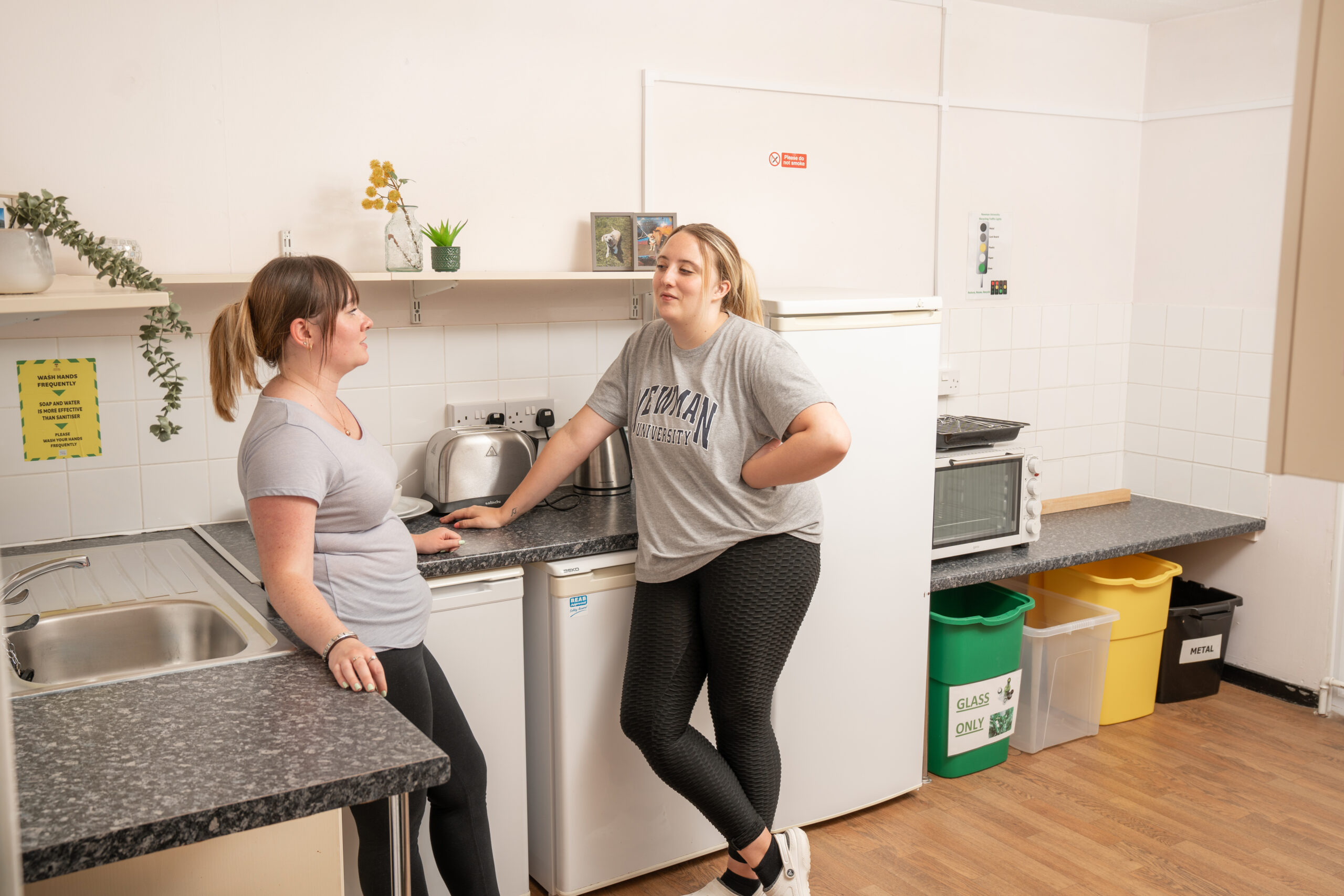 students in the shared kitchen of the original halls