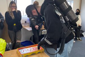 BA Professional Policing student taking part in an activity during a visit to the National Chemical, Biological, Radiological, and Nuclear (CBRN) Centre, at the College of Policing.