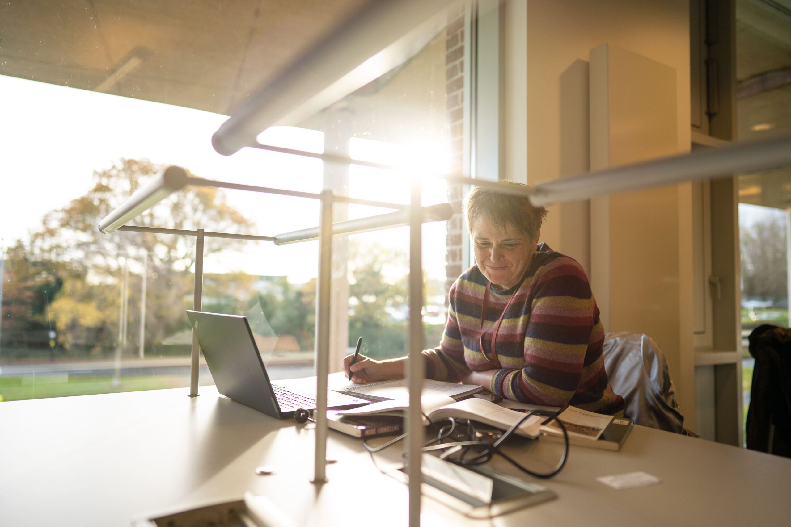 Theology student studying in the library