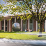 Exterior of Newman with globe