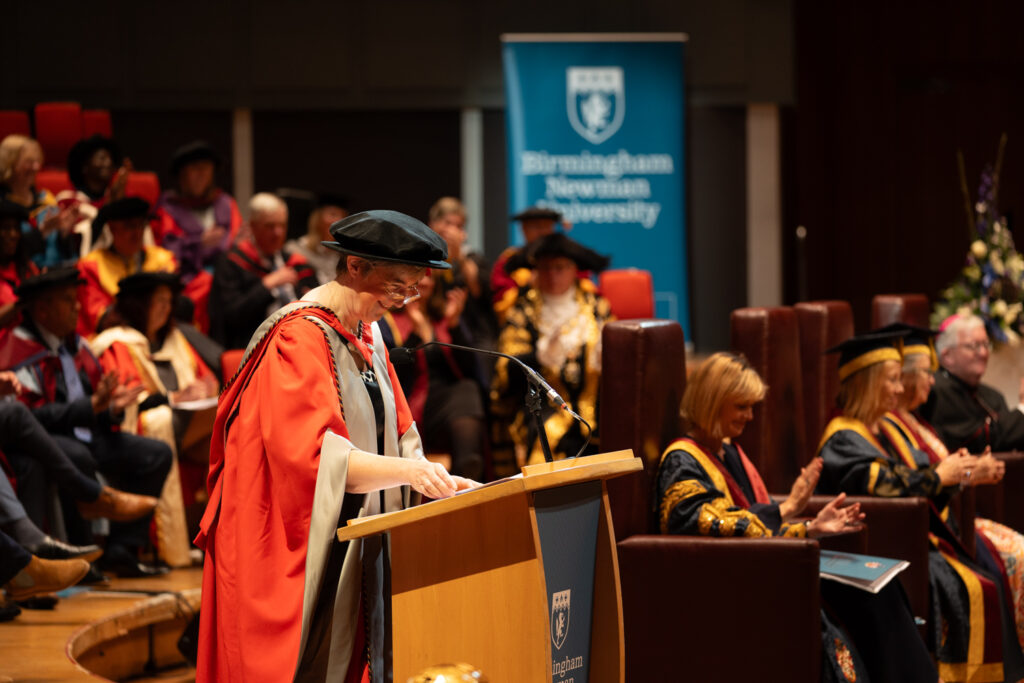 Dr Dawn Casserly giving speech on stage