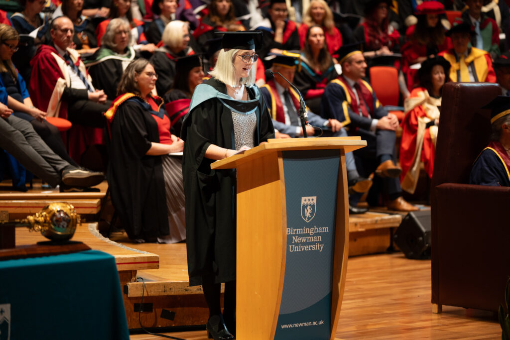 Academic giving speech on stage