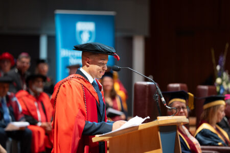 Joe Fraser speech on stage