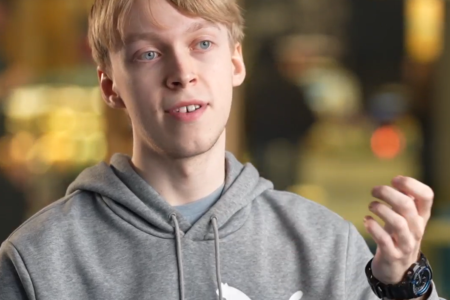 a man in a grey hoodie
