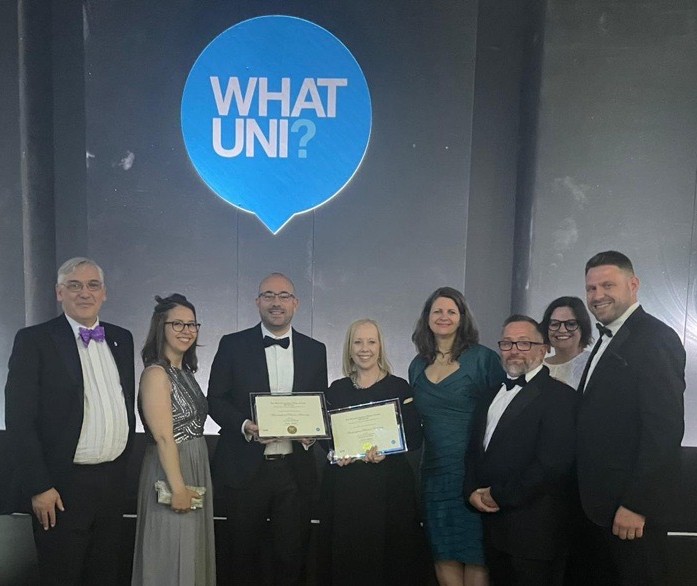 Birmingham Newman University staff receiving What Uni awards