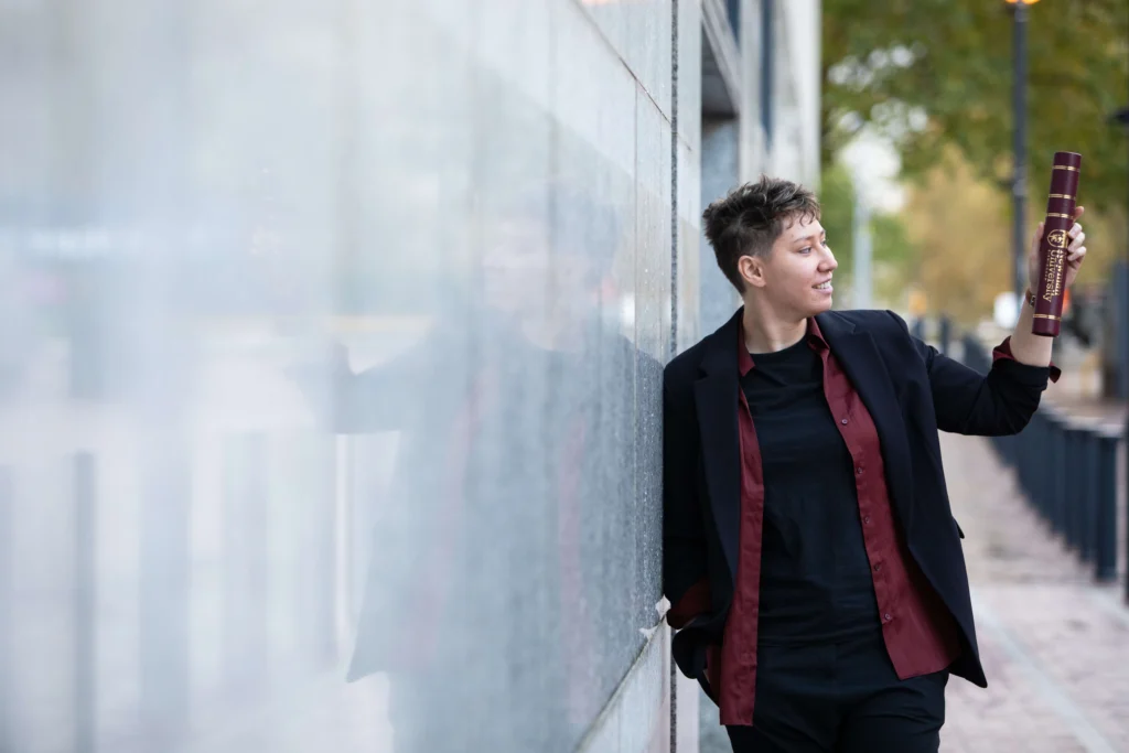 Alumnus with certificate