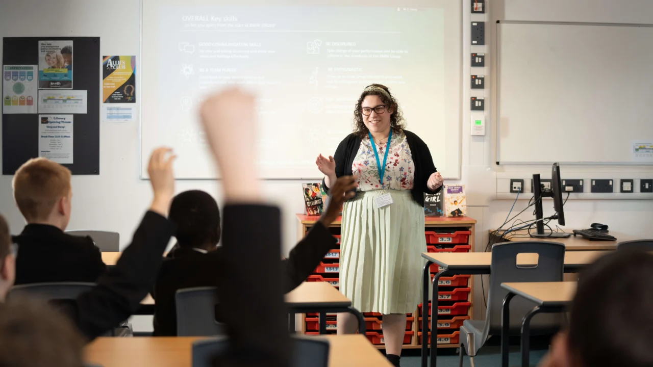 Teacher in class at secondary school