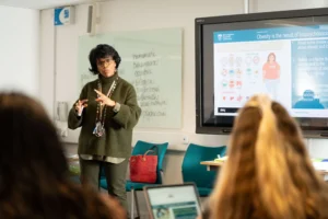 Teacher in class at secondary school